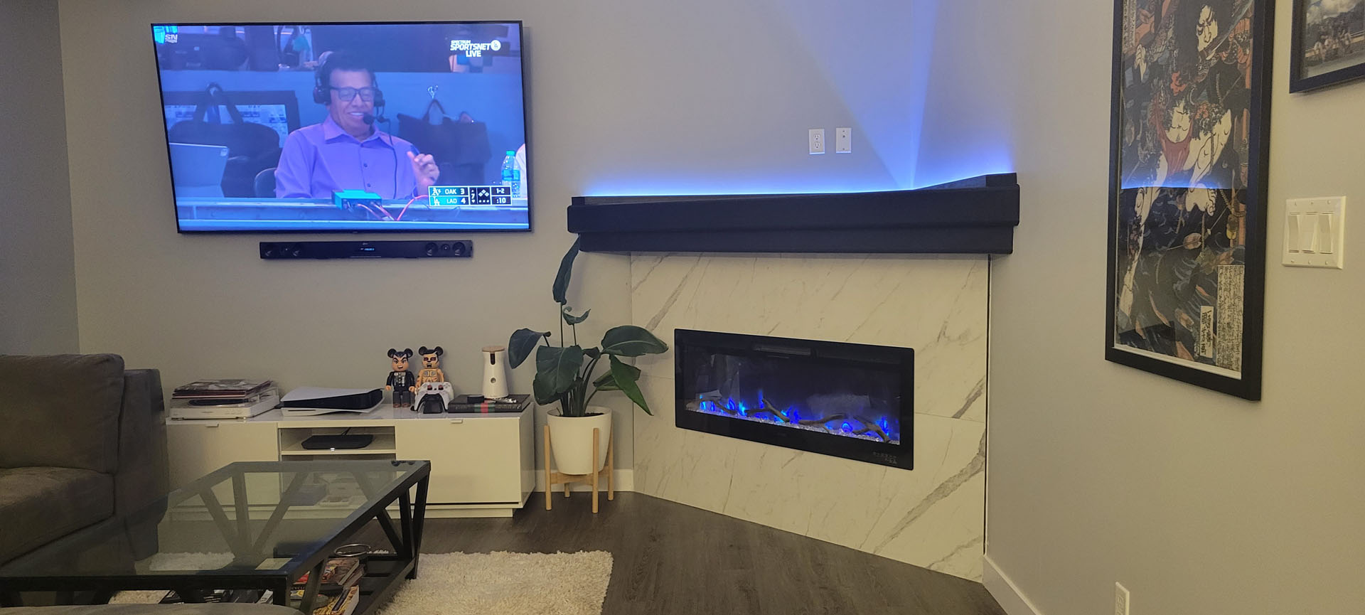 Electric fireplace with marble surround and LED accent lighting